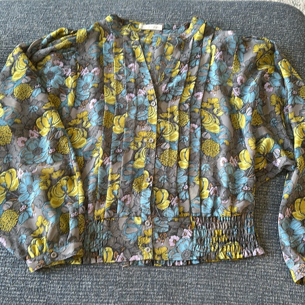 Multi colored long sleeve blouse.